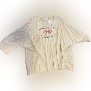 Cream tee Shirt with Embroidered Design